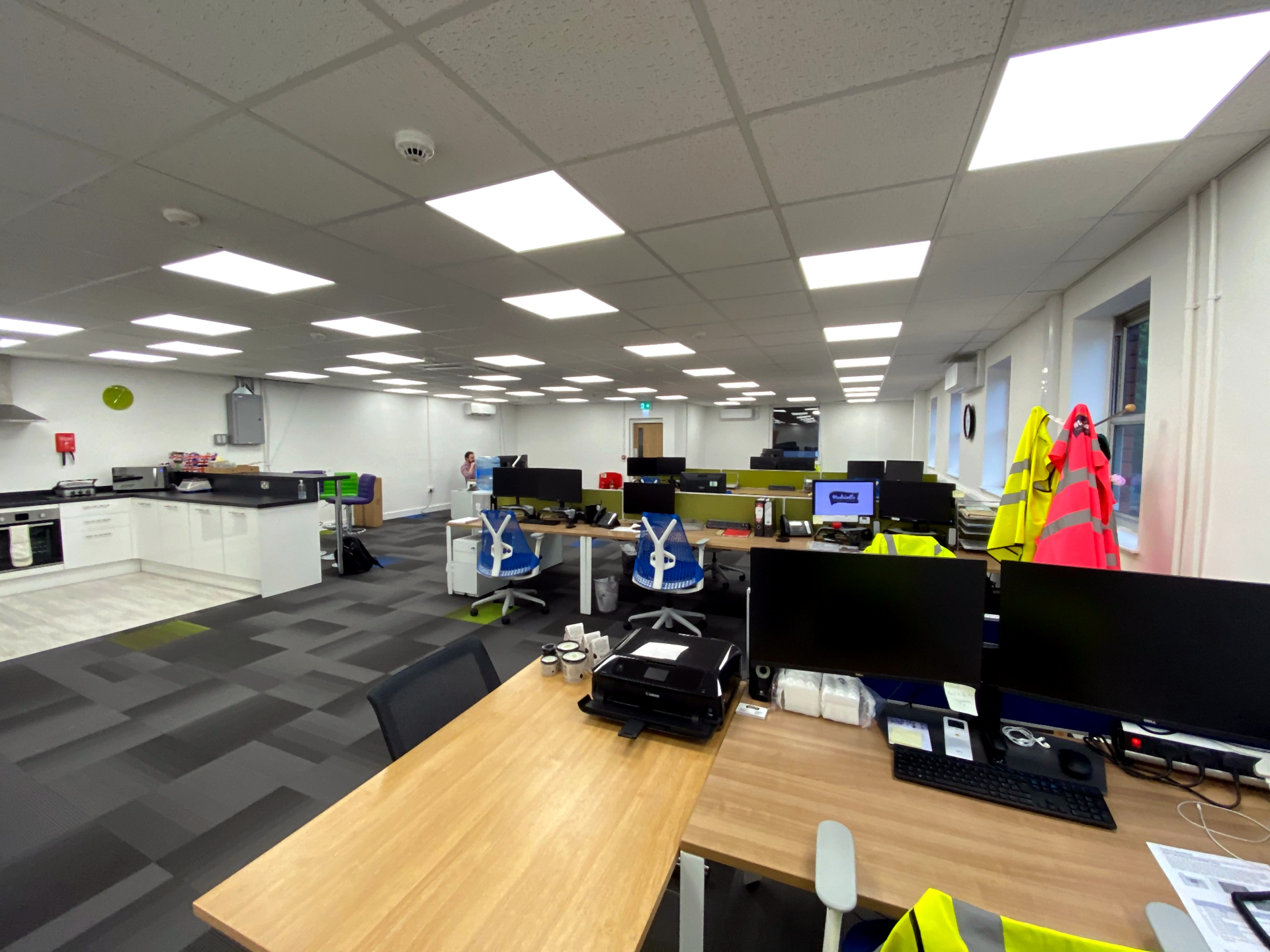 Modern office fit out with desks and kitchenette